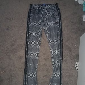 Snake print adidas track pants